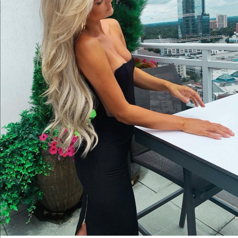 Black mini dress. Sheer sides with back zipper